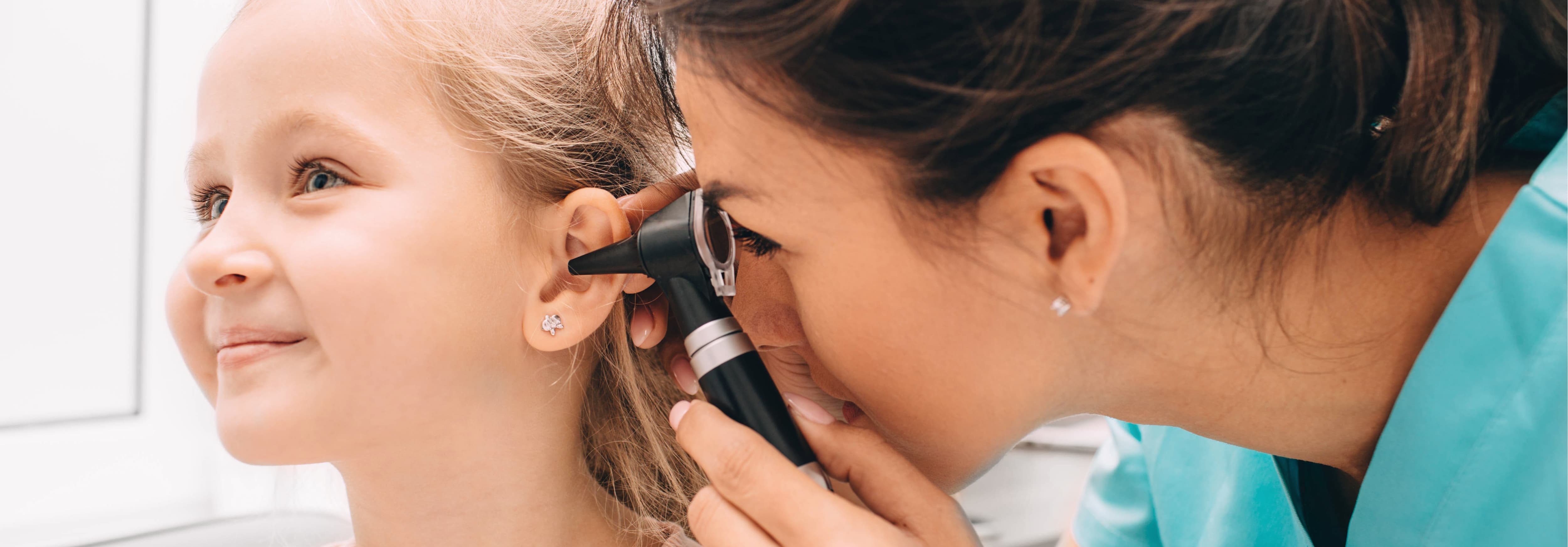 Audiologist Checking on a Patient